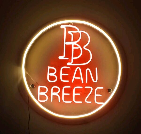 Functional signs for storefronts including "OPEN", "SALE", and branded logos for "Bean Breeze".