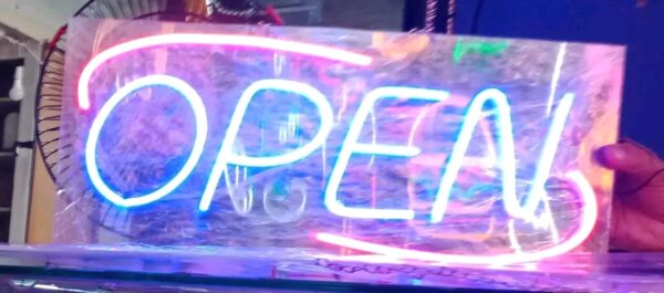 Functional signs for storefronts including "OPEN",